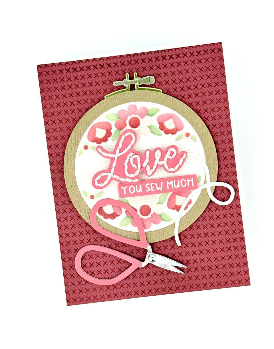 Handmade greeting card with embroidery hoop on it and love you sew much sentiment on it.